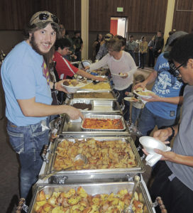 A long line of hungry folks dug into nine entrées, elk dip, potatoes, salad and vegetables as part of the sixth annual Wild Game Dinner on Saturday night at CNCC-Rangely.  The event included music by Rangely group Fiscus & Gravy and silent and vocal auctions. Roughly 100 people took part in the event.