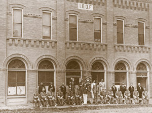 Meeker’s Odd Fellows pose in front of their new building.