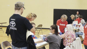 Volunteers were helping en masse at the 9Health Fair at Meeker Elementary School on Saturday. Above, phlebotomists from all neighboring towns were on hand as were students from the CNCC dental hygiene school and health agencies from throughout the area joined efforts to deal with the roughly 600 people who attended the health fair on Saturday. The fair was sponsored by Channel 9, Pioneers Medical Center, the Rio Blanco Fire Protection District and the Meeker Lions Club. Organizer Christy Atwood of Pioneers Medical Center said, “It was another successful year. I appreciate working with Channel 9 and appreciate all the members of the community taking part.”