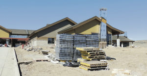 A view of the outside of the Walbridge Wing assisted living center shows off two chimneys that will help residents feel at home during their stays. The center features 30 private rooms each with a toilet and sink and air conditioning, whereas the existing Walbridge Wing has only 16 semi-private rooms.