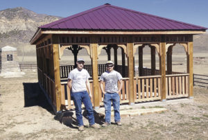 Jake Smith and Dillon Frantz were honored Monday at the Meeker High School awards assembly by the Rio Blanco County Historical Society for volunteer assistance with the construction and installation of the decorative railing and filigree at the Milk Creek (Thornburgh) Battleground Memorial gazebo on County Road 15. Industrial arts instructor Zach Clatterbaugh was also honored for the work as were Caleb Bradford, Ty Gibson, Dade Heck, Tyler Ilgen, Jake Nielsen, Cody Nielsen, Connor Pfister and Levi Dinwiddie.