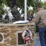 At 8 a.m. Monday, the public was invited to join the men and women from the Rangely Veterans of Foreign Wars Post at Hefley Park in downtown Rangely for the laying of a wreath at the Veterans Memorial. Other items such as flowers and an American flag were also laid at the foot of the statue. Despite light rain, approximately 35 members of the public came out to remember those who who gave of their lives in service to America as well as those still serving in the U.S. Armed Forces.