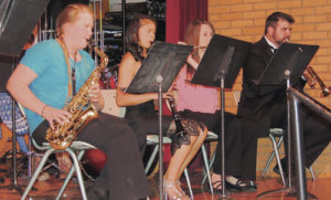 Meeker High School/Barone Middle School music director Jeff Hemingson, far right, joined the Jazz Band members at Monday night’s 2015 MSD Spring Concert. Members of the Jazz Band are Lauren Urista on alto sax, Delenn Mobley on clarinet and Shelby Steele on flute. Not visible behind the band is percussionist Macy Collins.