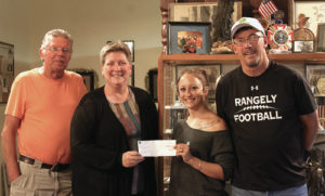 On June 10, Rangely Elks Lodge No. 1907 received a donation from the Chevron Corp. for $6,500. Lodge Exalted Ruler Jeff LeBleu said that $5,000 would go toward Christmas food baskets and that the other $1,500 would be donated to Rangely Community Gardens. Community Gardens is a group of local children, adults and farmers who get together and grow a full arrangement of vegetables for the folks of Rangely to enjoy. They also teach the children how to garden, which has turned into a positive influence on the participants. From left to right are Elks Bill Cady, Secretary Teresa Cady, Elk Rachel LeBleu and Exalted Ruler Jeff LeBleu.