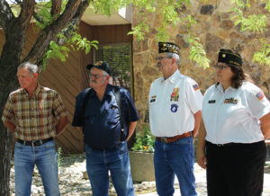 Members of the Rangely VFW Post gathered with residents and other officials to mark Flag Day and hold a ceremony in honor of the Stars and Stripes. Members of the Rangely post are, from left to right, Cork Powell, Joe Ingram, forer post commander Hoot Gibson and new post commander Lisa Hatch.