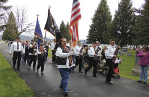 Members of Veterans of Foreign Wars Post No. 5843, members of the Ladies VFW Auxiliary and members of the Meeker American Legion Post No. 74 marched in Highland Cemetery in Meeker to mark the beginning of the Memorial Day observance in Meeker. The ceremony was complete with laying a wreath on the memorial in the cemetery, a 21-gun salute and “Taps.”
