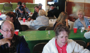 The seats at the Buford School Fish Fry kept rotating with new people coming to eat. The inside kept filling and emptying, above, while people kept coming and going and filling the seats inside and outside. The sponsoring White River Community Association reported that close to 200 people took part in the white fish, side dishes and salads between 4-6 p.m. on Saturday.