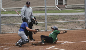Austin Davis, who is safe at home as the Panthers defeated Craig on May 27 by a score of 8-2.