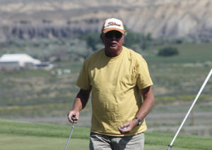 Bill Cady celebrates a bit after recording a birdie at the annual Rangely Elks Golf Tournament at Cedar Ridges Golf Course in Rangely on June 13.