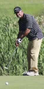 Meeker’s Pat Walsh watches as his ball heads toward the hole during the Two-Man, Best Ball Tournament at Meeker Golf Course during weekend play. Walsh and his partner, Willy Theos, captured second place in the second flight of the tournament, which ran Saturday and Sunday. The overall winners in the tournament were Doug Choate and Jared Brown.