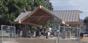 The new gazebo, located at the intersection of Fifth and Main streets in Meeker, is seen here near completion. The 1,500-square-foot facility is expected to be completed and the fence removed around the gazebo by start of Range Call activites, Commissioner Shawn Bolton said on Friday. There will be electrical hookups nearby to start and that may be replaced later with electrical boxes on each of the four corners.