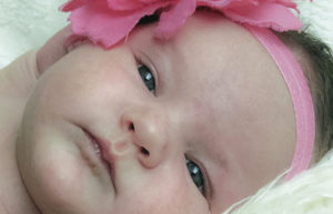 Nicholas and Lindsey Cook are pleased to announce the birth of their daughter, Kinslee Brooklyn Cook, at 11:55 a.m. on July 8, 2015. Kinslee weighed 9 pounds, 12 ounces and was 20 1/2 inches long. The baby’s maternal grandmother is Roxy Taylor of Meeker. Maternal great-grandparents are Bob and Ruby Crawford of Grand Junction. Paternal grandparents are Mike and Lisa Cook of Meeker. The paternal great-grandparents are Melvin and Joann Barley of Meeker and Leota Cook of Meeker. Among her loving family, Kinslee was welcomed home by her loving big sister, Aubree Sofia Cook.