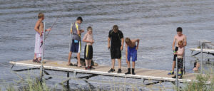 Saturday was a beautiful day in the mountains east of Meeker, and these two fishermen, as well as several other boats on the lake, took advantage of the glass-like waters on Lake Avery to enjoy their mid-afternoon pastime. There were plenty of folks on the lake and a number of family members and friends enjoying swimming off the docks.
