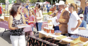 The pie auction at the 2014 Mountain Valley Bank Fall Festival was a large success. Several pies, jams, jellies and salsas were part of the auction. Above, auctioneer Bryce Purkey headed up the auction, assisted by Trina Zagar-Brown of the White River Electric Association. The 2015 edition of the Fall Festival will take place Saturday from 11 a.m. to 2 p.m. at the bank, and all income from the auction will go to the Rio Blanco County 4-H Foundation.