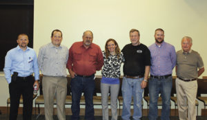 On Sept. 17, Rangely District Hospital held a reception to welcome two new physicians on board at the hospital. Among those present were, from left: Nick Goshe, the CEO for Rangely District Hospital; new physician Dr. Kenneth Sutton; Steve Petersburg, a member of the hospital board of directors; new physician Dr. Abigail Urish; and three more RDH board members, John Payne, Jason Kurrasch and Buford Adams.