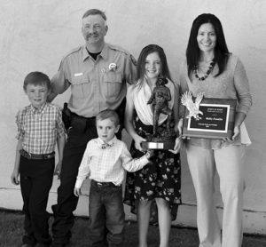 Meeker’s Bailey Franklin was recently named Wildlife Officer of the Year by Colorado Parks and Wildlife. From left to right are son Monty Franklin, Bailey Franklin, son Miles, daughter Hadley and wife Ann Franklin.