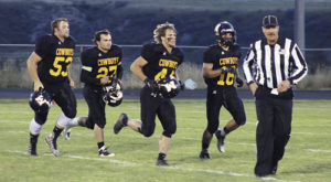 Meeker seniors Kash Atwood, Dillon Frantz, Devon Pontine and T.J. Shelton were the team captains for the 2015 homecoming football game against the Lake County Panthers. The senior captains led the Cowboys to a 45-14 victory in the first league contest of the season. The Cowboys will play the defending state champion Eagles in Paonia on Friday, with the kickoff scheduled for 7 p.m.