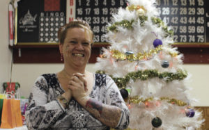 A festive time was had at the Rangely Elks Lodge on Saturday as members held their annual Christmas party for the children. Becki Davis, left, appears to be feeling the holiday spirit, smiling and having fun. Roughly 75 children attended the party along with their parents. There were all kinds of activities and each child who spoke to Santa received a bag of gifts.