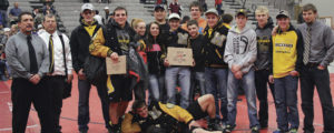 The Meeker Cowboys won 36 matches in the 2015 Warrior Classic, 24 by pin, which earned bonus points, enough for Meeker to be the “Best Small School” team and fifth overall. Meeker’s three-time state champion T.J. Shelton won his first individual Warrior title and was named “Outstanding Wrestler” in the upper weights. Head coach J.C. Watt said he was “really proud of all the kids” and the Warrior Classic was a “good confidence builder” for his team. Pictured are assistant coach Carl Padilla, head coach J.C. Watt, Chase Rule, T.J. Shelton, team managers Abbey Morgan and Avery Watt, Tyler Ilgen, Sheridan Harvey (holding trophy), Jacob Pelloni, Caleb Bradford, Hunter Garcia, Tannen Kennedy, Casey Turner, Garrett Frantz and assistant coach Tyrell Turner. Devon Pontine is in front.