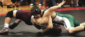 Rangely senior Jessy Powell scores back points during a match in the Screamin’ Eagle wrestling tournament held in Paonia. Powell recorded a pin in the 145-pound bracket, and Panther coach Travis Witherell named him the team’s “Athlete of the Week.” 