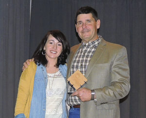 Rangely Chamber Executive Director Kristin Steele, left, presented Jeff Proctor of DUCO Inc., with the Industry of the Year Award.