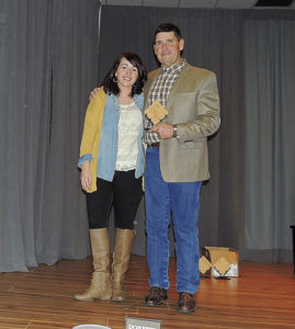 As well as feeding at least 200 people at the Rangely Chamber of Commerce’s Crab Crack on Feb. 6 on the Colorado Northwestern Community College campus, the chamber also handed out their business awards of the year. Above, Rangely Chamber Executive Director Kristin Steele, left, presented Jeff Rector of DUCO Inc., with the Industry of the Year Award.