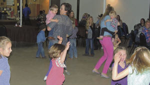 Dancers ranging in age from very young to not so young took to the dance floor on Saturday following the After Birth Ball, a celebration of the calving and lambing season as well as a fund-raising event for the Meeker High School FFA. More than 150 people took part in the prime rib dinner catered by Holliday’s in Meeker then joined in with the dancing to music by the Caleb Dean Band. There was also a silent auction and regular auction of goods to help FFA raise money for their projects and expenses for the upcoming year. The event was held at the Fairfield Center in downtown Meeker and all the serving and attending to those present was done by the members of the FFA.
