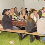 Despite rain, hail and wind prior to the start of the annual Meeker Chamber of Commerce Membership Dinner on Friday night, there was a full house of attendees who still had to brave a sometimes-tough wind near the new town gazebo in downtown Meeker. The meal was catered by Ma Famiglia. 