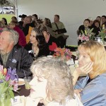 There were lots of hungry faces dodging the rain, hail and wind on Friday under a large tent as the Meeker Chamber of Commerce held its annual membership dinner and awards presentation. A dinner of pork shanks and fried chicken catered by Ma Famiglia help the members keep warm and the turnout was quite good.