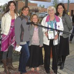 Two major awards were presented Friday night at the annual Meeker Chamber of Commerce Membership and Awards Dinner, held outside this year near the gazebo between the old courthouse and new Justice Center in downtown Meeker. From left to right, Meeker Chamber Executive Director Stephanie Kobald, Chamber Board Member Ann Marie Scritchfield and her daughter, Eva, present Diane Dunham with the Citizen of the Year Award for all of her volunteer work for several organizations in Meeker. At far right is Meeker Board President Diana Jones.
