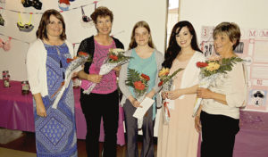 The Pioneers Healthcare Foundation presented five scholarships Saturday at their annual Forks & Flavors gala dinner fundraiser to raise funds for a 3-D mammography machine. Scholarship recipients are, from left to right: Karen Dinwiddie, Catherine Eliasen for daughter Anna Eliasen, Faith Patterson, Meghan Gerloff and Taylor Nielsen.