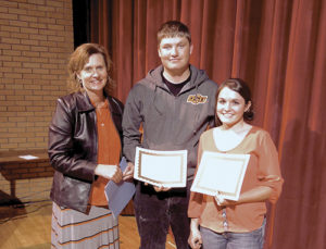 At the May 11 Meeker High School awards assembly, Principal Amy Chinn stands with the 2016 Quigg Newton Award winners, Jacob Smith and Madison Shults. The award is named for a former mayor of Denver and president of the University of Colorado. Chosen by high school staff, the awards recognize honesty, respect for others, cooperation with fellow students and adults, good attitude toward work and activity assignments, willingness to accept and carry out responsibilities and efforts to improve themselves and their school.