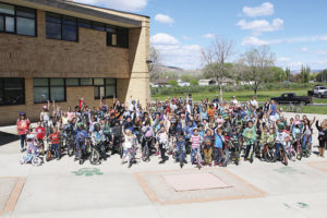 Roughly 200 students are pictured here after riding their bicycles to school for the annual Rangely Ride Your Bike to School Day on May 11. A number of games, activities and a bike rodeo were all a part of the event, which was considered a sweeping success.