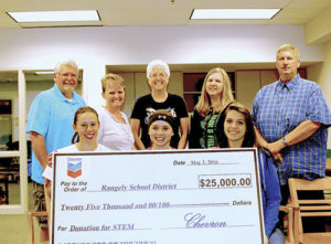 Rangely School District RE-4 board members Kurt Douglas, Leslie Nielsen, Joyce Key, Annette Webber, and Sam Tolley are joined by Rangely High School students Lindzey Thacker, Katelyn Brown and Sarah Conner in saying thank you to Chevron for its continued support of the school district.
