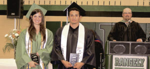 Rangely High School Athletic Director Crandal Mergelman, back right, announced the top senior athletes on Saturday evening during the 2016 RHS Commencement Exercise. Winners of the awards were Courtney Bell, left, and Cristo “Kiki” Ruiz.