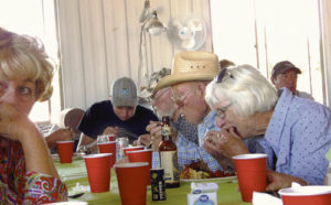 Among the many folks enjoying a rib dinner courtesy of the Rio Blanco County Cattlewomen on Friday evening at the Upper Colorado Environmental Plant Center on County Road 4 were, from left, Connie Hughes, Ty Dunham, Gary Dunham, Bill Dunham and Diane Dunham. The purpose of the gathering was a landowner appreciation barbecue put on by the Douglas Creek and White River conservation districts and a tour of the plant center.