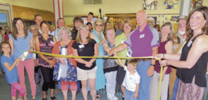 The Meeker Chamber of Commerce held a grand opening and ribbon cutting for the new Smoking River Studio Arts business at 627 Main St. in downtown Meeker. It is a juried, member-owned and operated artisan cooperative that operates as a gallery and studio. The business was the brain child of Jill and Dale Dunbar with the help of several other residents. Present for the ribbon cutting were, from left to right: Allison Kobald, chamber executive director Stephanie Kobald, artist Tony Francis, artist Steve Gamba, artist Cindy Rholl, artist Ted Relihan, artist Stephanie Gamba, photographer Dale Hallebach, artist Kathy Mayburry, artist Jaclyn Hafkenshiel, Cindy Welle, Jill Dunbar, young Jackson Dunbar, Dale Dunbar, artist Pat Sheeran-Daggett, Jere Taylor and chamber president Diana Jones.
