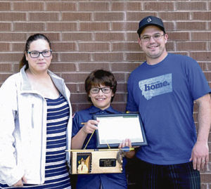 Rangely Cub Scout Ashton Cardin recently received his Arrow of Light award with Rangely Cub Scout Pack No. 191. The Arrow of Light is the highest award one can earn in Cub Scouts. Ashton is pictured here with his parents, Cherise and Don Cardin.