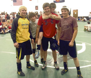 The defending state champion Meeker Cowboys sent five wrestlers to Paonia for a wrestling camp, and according to high school assistant coach Carl Padilla, “We had a great camp; the kids wrestled well.” Attending the camp were Casey Turner, Jacob Pelloni, Caleb Bradford, with Tannen Kennedy on his back and Hunter Garcia. Several Cowboys will attend another camp this week in Gunnison.