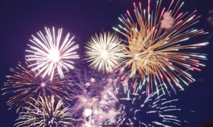 A barrage of different-colored rockets continuously bombarded the sky above Highland Cemetery on Monday night with a fireworks show that was well grouped and showed some new designs. Hundreds of people filled Meeker Town Park and Meeker Circle Park while residents could be seen in streets, in trees and on rooftops taking in the lights.