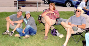 The Summer Entertainment Series continued on Friday by the Downtown Pavilion and the county courthouse lawn featuring The Poser Band from the Front Range. The band played a variety of music from country to The Beatles, and enjoying the variety of music were Meekerites, from left, Mike Jones, Paige Jones, Jill Dunbar and Dale Dunbar.