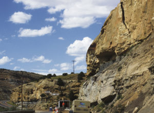 State road crews working on a rock scaling project on Colorado Highway 64 at milepoint 26 closed the highway to traffic the evening of July 20 and during the day on July 21 due to concerns about the stability of a large slab of rock (split is visible above). During the closure, motorists were encouraged to utilize alternate routes Colorado Highway 13 or Colorado Highway 139, known as Douglas Pass.