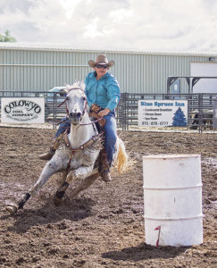 It is a real challenge to race a horse around barrels when the horses have to turn sharply in mud that is several inches deep. Above, Meeker’s Lauren Urista takes the obstacles in stride in this ride as part of the barrel race held Sunday evening in the CPRA-sanctioned rodeo at the Rio Blanco County Fairgrounds in Meeker as part of Range Call.
